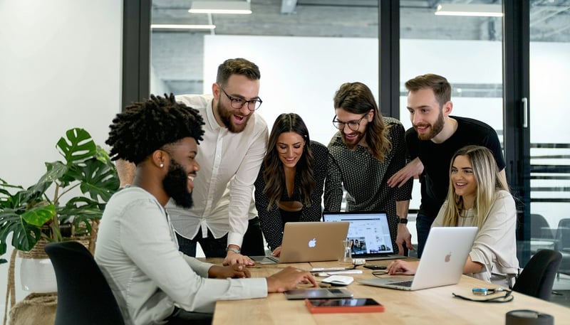 Team of digital marketing experts collaborating at Exquisite Enterprises